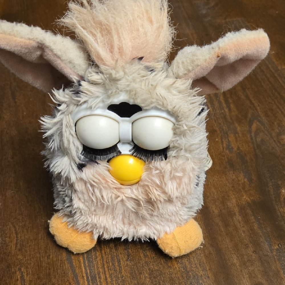 Interactive Plush Toy with White and Yellow Accents